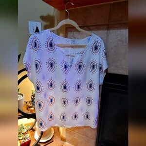 White and Blue Patterned Women's Top. Keyhole Neckline